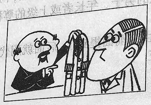 A man holds up a coat to another man.