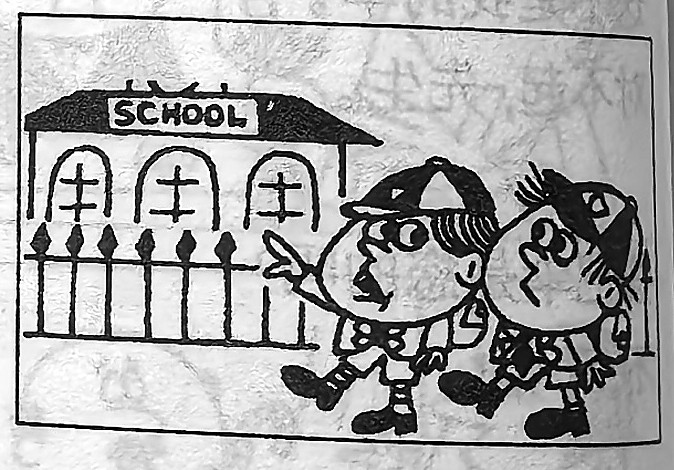 Two children stand in front of a school.