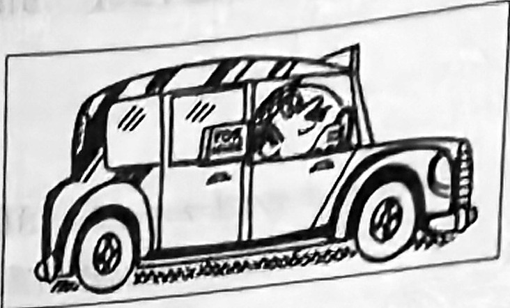 A taxi driver sits behind the wheel of a taxi.
