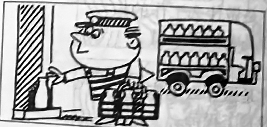 A milkman carries bottles beside his delivery vehicle.