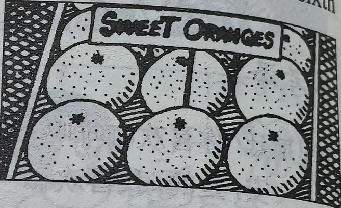 Oranges with a SWEET ORANGES sign.
