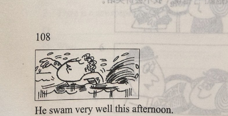 A man swims very well in the sea, kicking up a big splash behind him.