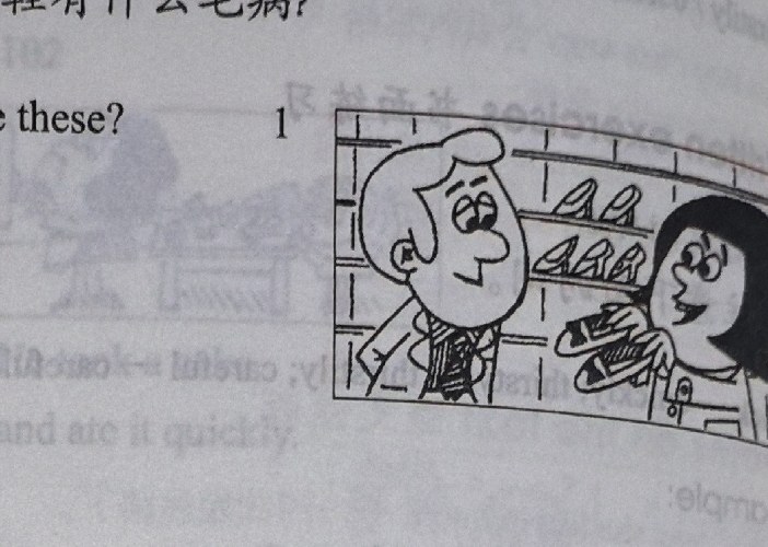 The lady shows the shop assistant a pair of fashionable shoes in front of a shelf of shoes.