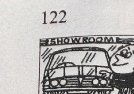 A boy looks at a car in a show room and wants one like that.
